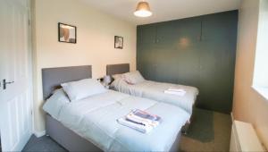 Katil atau katil-katil dalam bilik di Sheffield serviced apartment