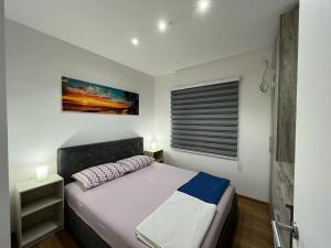 A bed or beds in a room at Bamsae Belgrade