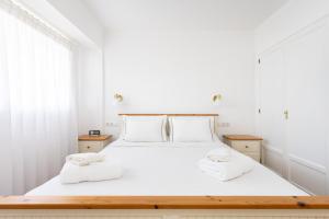 Llit o llits en una habitació de Prime Parque Avoceta Apartment