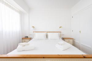 Postel nebo postele na pokoji v ubytování Prime Homes Parque Avoceta + 37 fotografií