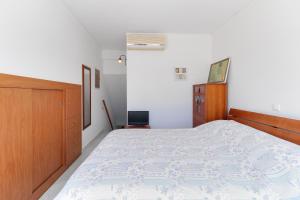 Postel nebo postele na pokoji v ubytování Zoumperi Cute and Cozy close to airport and Rafina