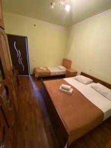 Posteľ alebo postele v izbe v ubytovaní NAREK B&B