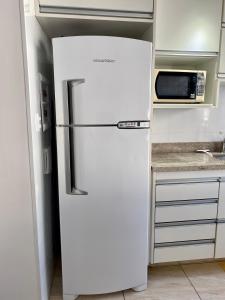 Η κουζίνα ή μικρή κουζίνα στο Apartamento Pitangueiras