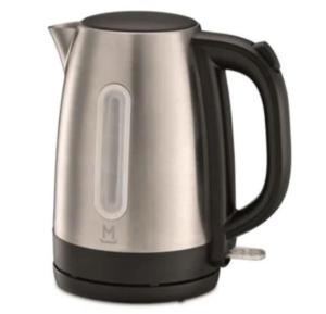 a black and silver kettle on a white background at Maison en Location Fresnes sur Marne in Fresnes-sur-Marne