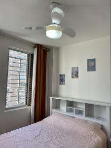 Ένα ή περισσότερα κρεβάτια σε δωμάτιο στο Apartamento Pitangueiras