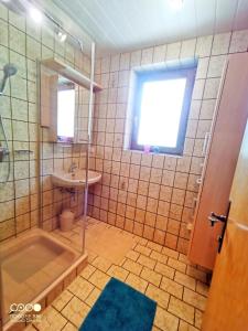 Ванная комната в Haus Grubbach