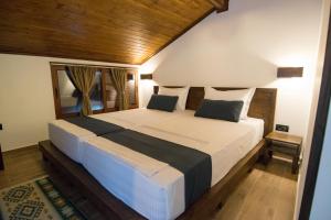 Postel nebo postele na pokoji v ubytování KALE GUESTHOUSE