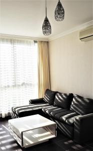 Posezení v ubytování Dolce Vita II Waterfront Aura Sea View Luxury Apartament + 37 fotografií