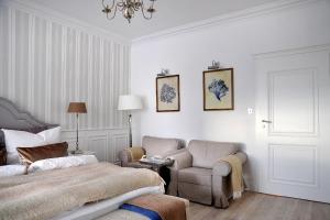 Ένα ή περισσότερα κρεβάτια σε δωμάτιο στο Villa Celine