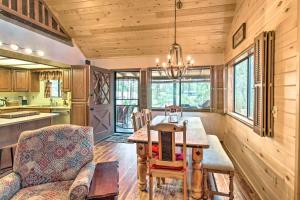 a kitchen and dining room with a table and a couch at Deck, Porch and Grill Heber-Overgaard Getaway! in Heber
