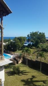 Басейн в Les Chandels Appartement avec terrasse vue mer Manapany les bains або поблизу