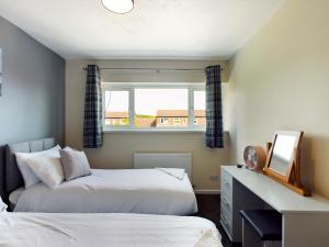 Кровать или кровати в номере 247 Serviced Accommodation in Telford- 3BR HOUSE
