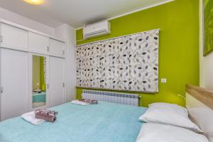 Postel nebo postele na pokoji v ubytování Studio Gordana with Terrace