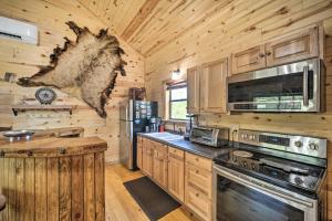 A cozinha ou cozinha compacta de 2 Rustic Cabins with Porches on Remote Ranch!