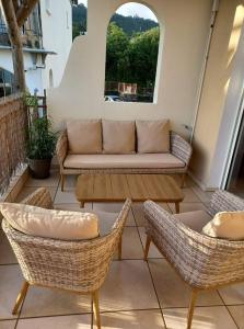 Зона вітальні в Les Chandels Appartement avec terrasse vue mer Manapany les bains