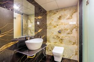 Koupelna v ubytování Hotel BKC Corporate Inn