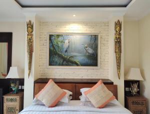 Letto o letti in una camera di Gefecon Villa Ubud