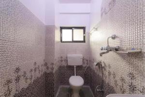 A bathroom at Hotel Immortal Inn