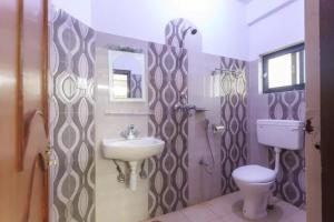 A bathroom at Hotel Immortal Inn
