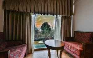 Area soggiorno di HOTEL METROPOLIS SRINAGAR