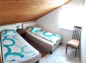 Posteľ alebo postele v izbe v ubytovaní Apartmani Sabira + 37 fotografií