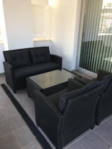 A seating area at Duna Beach - Infinity Pool