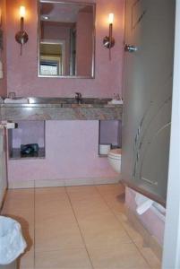 Ένα μπάνιο στο Ferienwohnung ELDENA