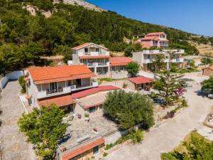 an aerial view of a village with houses at Minas Apartments in Divarata