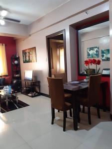 A television and/or entertainment centre at Sarasota Residential Resort cluster 4 Unit 6C & 6L by Manny Newport Blvd, across NAIA T3 & near Resorts World Manila, Pasay City