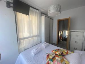 Postel nebo postele na pokoji v ubytování Apartamento Benalmadena playa