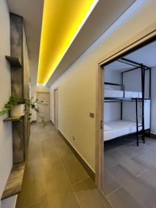 Posteľ alebo postele v izbe v ubytovaní Smart Rooms Naples