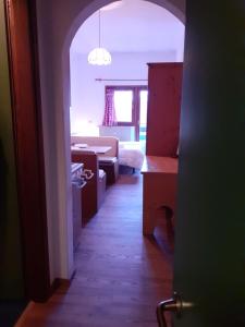 Posteľ alebo postele v izbe v ubytovaní Casa Neve e Sole - presso Sussy Residence