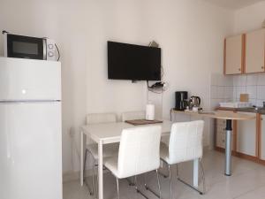 Kuchyň nebo kuchyňský kout v ubytování Apartments Verica