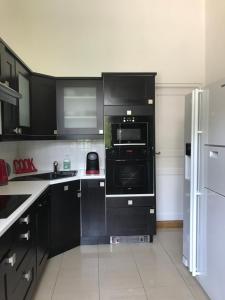 Kuchnia lub aneks kuchenny w obiekcie La Paix, Gîte bucolique en Normandie