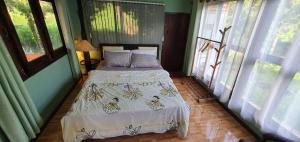 Voodi või voodid majutusasutuse Baan Suan Taboon Homestay toas