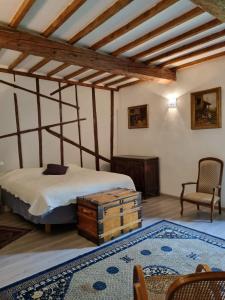 Posteľ alebo postele v izbe v ubytovaní Partie de Château du XI ieme à Canet d'Aude
