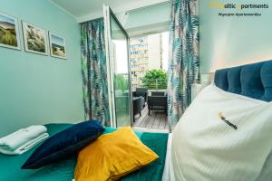 Łóżko lub łóżka w pokoju w obiekcie Baltic Apartments - Sun Towers