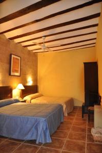 Katil atau katil-katil dalam bilik di Aljibe de Monastrell