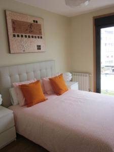 Кровать или кровати в номере Apartamento a 5 minutos de la playa