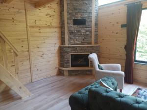 A seating area at AYDER LEVUT Bungalov