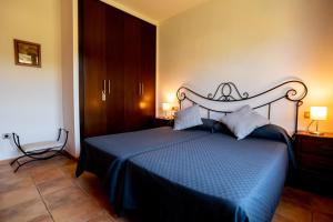Postel nebo postele na pokoji v ubytování Hostal El Guerrer
