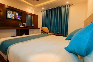 Letto o letti in una camera di Kathmandu Aagantuk Hotel