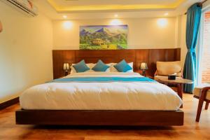 Letto o letti in una camera di Kathmandu Aagantuk Hotel