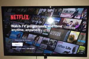 a television screen with a bunch of movies on it at Forest View - Castlewellan, County Down in Belfast