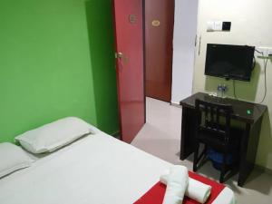 TV a/nebo společenská místnost v ubytování EZI HOTEL KLANG