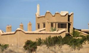 a large house with snow on top of it at Riad Jnane Ines in Taroudant