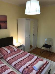 Posteľ alebo postele v izbe v ubytovaní Révai Apartman Fonyód
