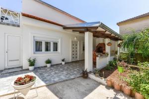 Vonkajšia záhrada v ubytovaní Apartment Yula