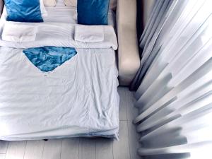 Postel nebo postele na pokoji v ubytování happy home
