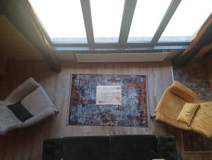 A seating area at AYDER LEVUT Bungalov